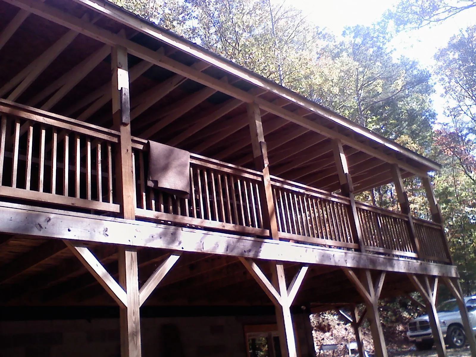 Timber framing under a new elevated porch and deck — Roof Leak Repair in Coventry by Roofing Brothers